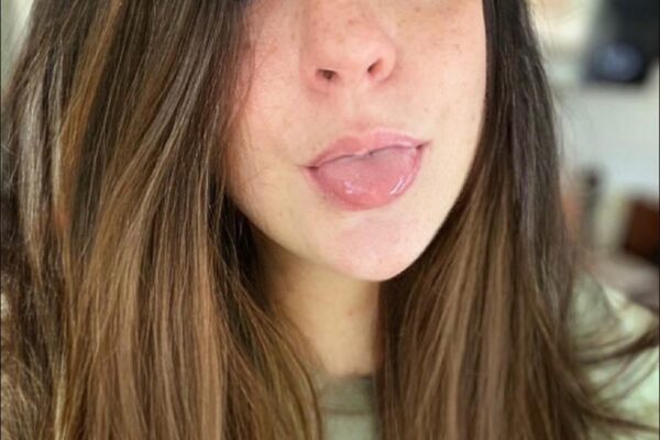 Maegan sticking out her tongue 1